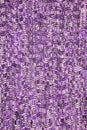 Wool scarf or sweater texture close up. Ultra Violet Knitted jersey background with a relief pattern. Royalty Free Stock Photo