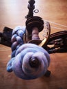 Wool spinning on old school spinningwheel Royalty Free Stock Photo