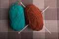 Wool threads and knitting needles. Hobby knitting. Royalty Free Stock Photo