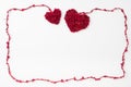 Wool weaved red heart with line isolated on white background