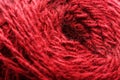 Wool yarn close-up colorful red thread for needlework in macro. Royalty Free Stock Photo