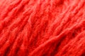 Wool yarn close-up colorful red thread for needlework in macro. Royalty Free Stock Photo