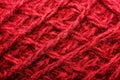 Wool yarn close-up colorful red thread for needlework in macro Royalty Free Stock Photo