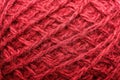 Wool yarn close-up colorful red thread for needlework in macro Royalty Free Stock Photo