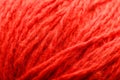 Wool yarn close-up colorful red thread for needlework in macro Royalty Free Stock Photo