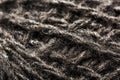 Wool yarn close-up gray threads for needlework in macro. Background texture fabric for knitting needle Royalty Free Stock Photo