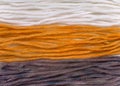 Wool yarn samples colored by henna and indigo