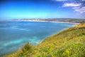 Woolacombe coast Devon England UK in summer with blue sky in hdr Royalty Free Stock Photo