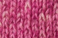 Woolen texture background, knitted wool fabric, pink hairy fluff