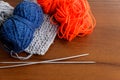 Woolen thread, knitting, knitting needles on wooden table Royalty Free Stock Photo