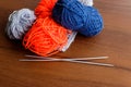 Woolen thread, knitting, knitting needles on wooden table Royalty Free Stock Photo