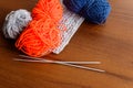 Woolen thread, knitting, knitting needles on wooden table Royalty Free Stock Photo
