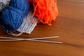 Woolen thread, knitting, knitting needles on wooden table Royalty Free Stock Photo