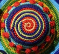 Threads woven together to form a colored spiral