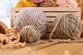 Woolen yarn and fabric on the window sill. Beautiful view outside the window - winter scenery and snow