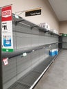 Woolworths supermarket empty toilet paper shelves amid coronavirus fears and panic buying Royalty Free Stock Photo