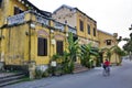 Wooman returning home in Hoi An, Vietnam.