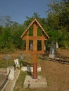 Wooden cross on a cemetery in the Romanian countryside