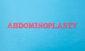 Word abdominoplasty in red letters on a blue background. The concept of correction of fat folds and cellulite on the Royalty Free Stock Photo