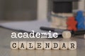 Word ACADEMIC CALENDAR composed of wooden dices Royalty Free Stock Photo