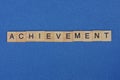 Word achievement made of brown wooden letters Royalty Free Stock Photo