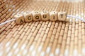 Word acquit lined with wooden cubes Royalty Free Stock Photo