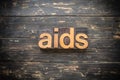 AIDS Concept Vintage Wooden Letterpress Type Word Royalty Free Stock Photo