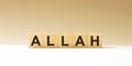 Word ALLAH made with wood building blocks