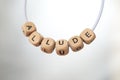 Word allude lined with wooden cubes