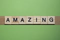 word amazing made of small gray wooden letters Royalty Free Stock Photo