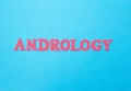 Word andrology of red letters on a blue background. The concept of the section of medicine dealing with the disease of