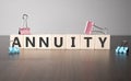 The word annuity written on wood cubes. Business and finance concept