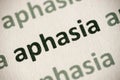 Word aphasia printed on paper macro Royalty Free Stock Photo