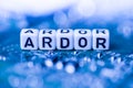 Word ARDOR formed by alphabet blocks on mother cryptocurrency