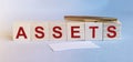 Word Assets on wooden cube blocks. Financial accounting. Money concept Royalty Free Stock Photo