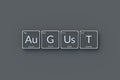 Word august in periodic table of elements style on metallic buttons Royalty Free Stock Photo
