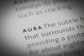 The word Aura close up on paper