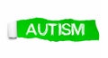 The word AUTISM appearing behind green torn paper