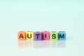 Word Autism made of colorful cubes on light background Royalty Free Stock Photo