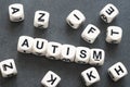 Word autism on toy cubes Royalty Free Stock Photo