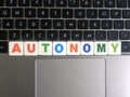 Word Autonomy on keyboard background Royalty Free Stock Photo
