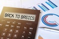 Word BACK TO BASICS on calculator. Business and finance concept Royalty Free Stock Photo