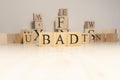 The word bad is from wooden cubes. Background from wooden letters Royalty Free Stock Photo