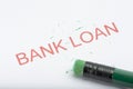 Word `Bank Loan` with Worn Pencil Eraser and Shavings Royalty Free Stock Photo