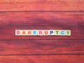 Word Bankruptcy on wood