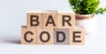 The word of BARCODE on building blocks concept on the white background, concept background