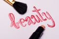 Word `beauty` written in lip gloss Royalty Free Stock Photo