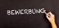 Word Bewerbung written on a blackboard Royalty Free Stock Photo