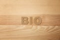 Word `Bio` made of cardboard letters on wooden background Royalty Free Stock Photo