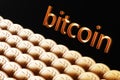 The word Bitcoin near a large number of bitcoin